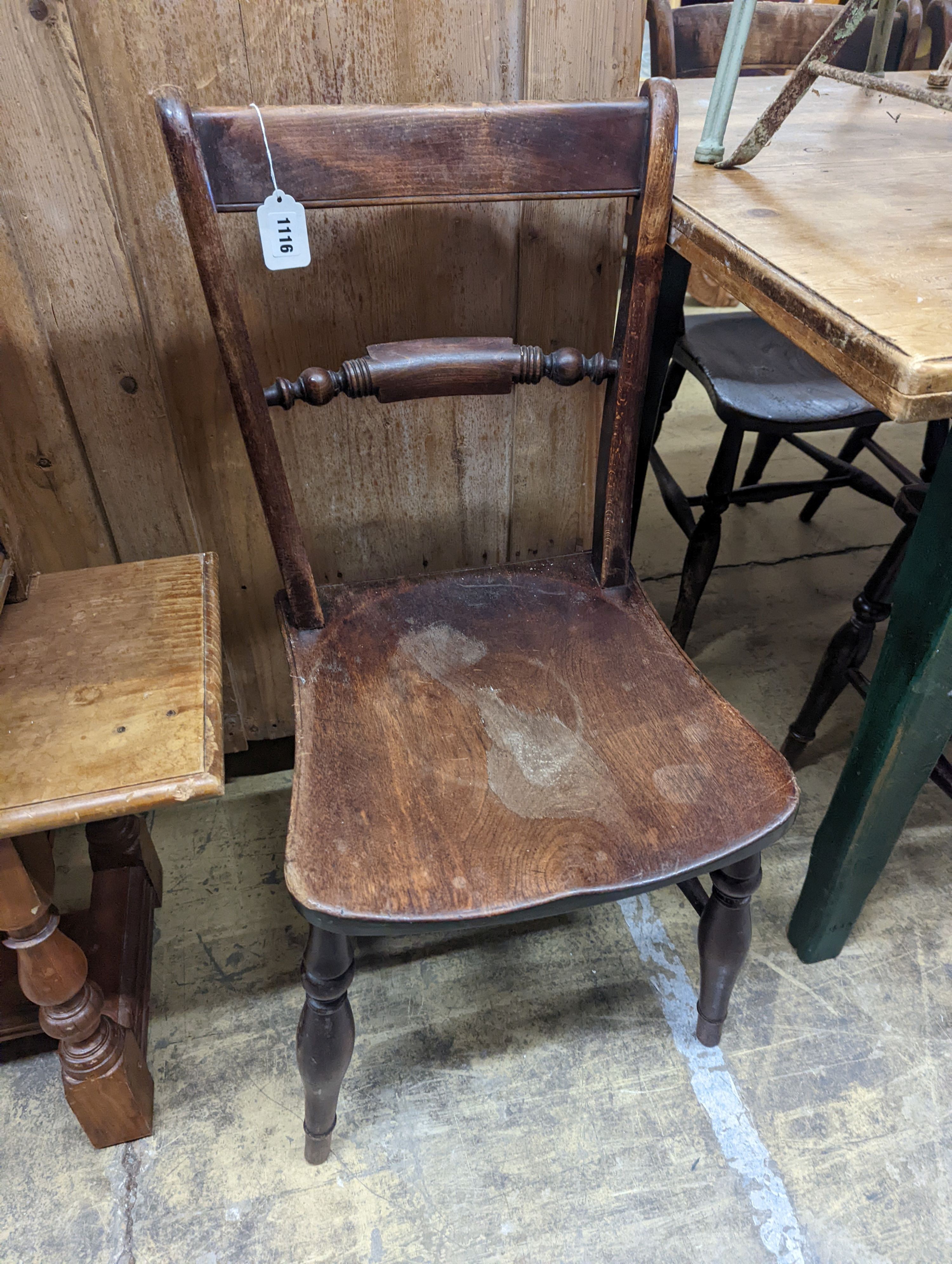 A harlequin set of eight 19th century beech and elm Windsor kitchen chairs